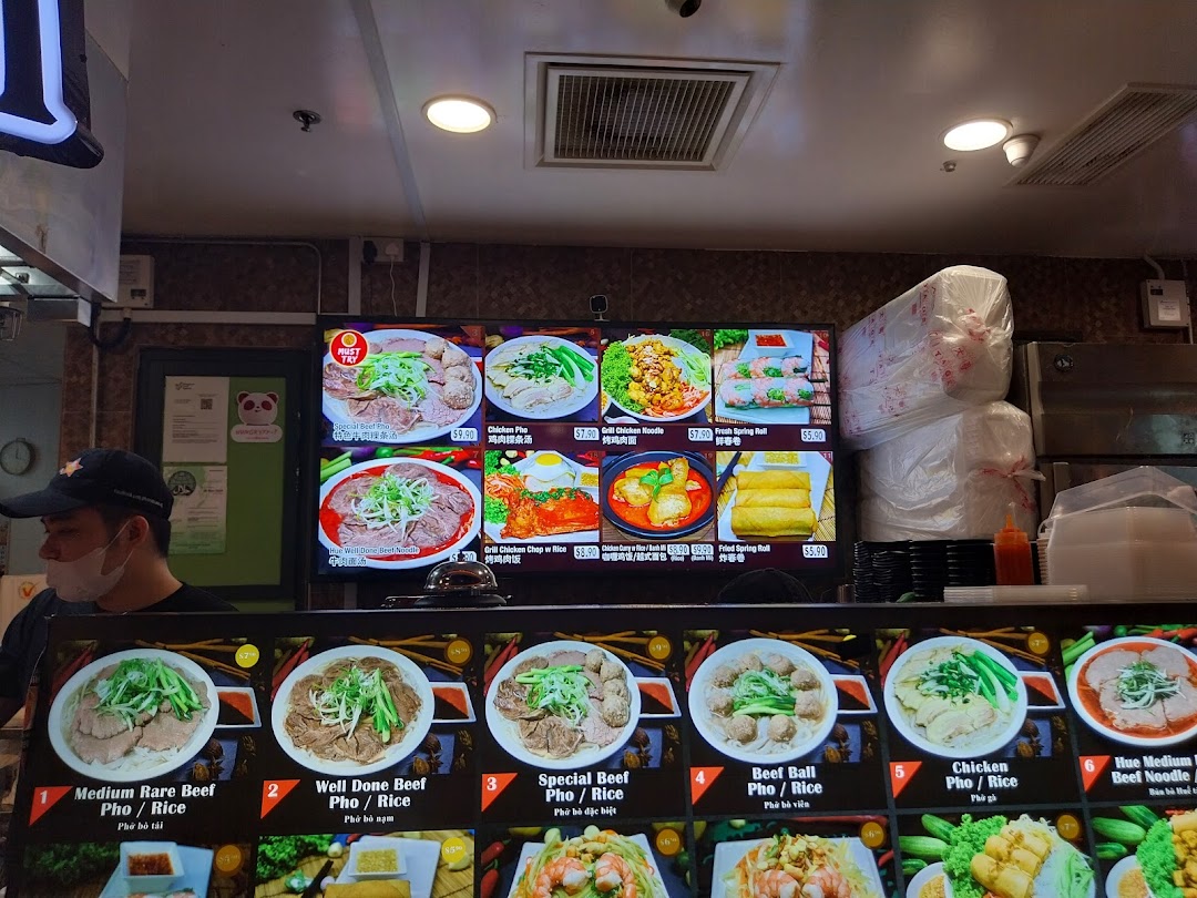 A vibrant digital and physical menu display showcasing various Vietnamese pho, noodle, and rice dishes.