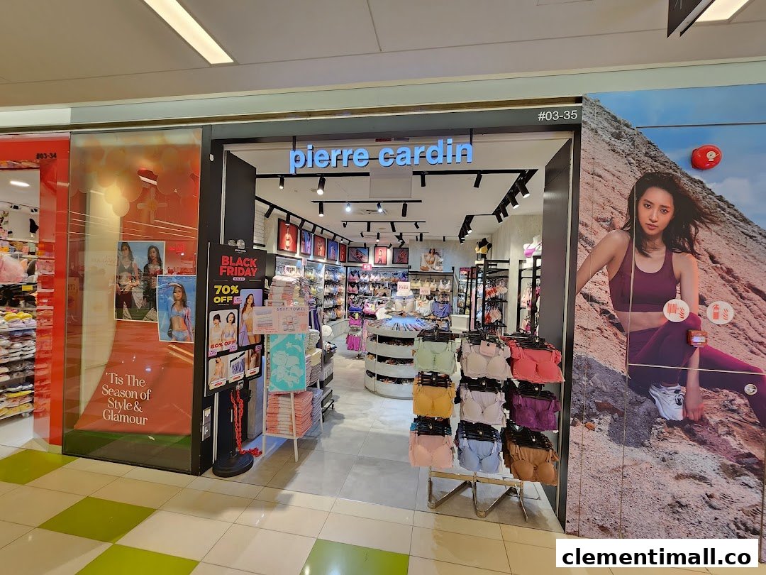 The shop front of Pierre Cardin Lingerie, featuring displays, promotional signage, and interior view.