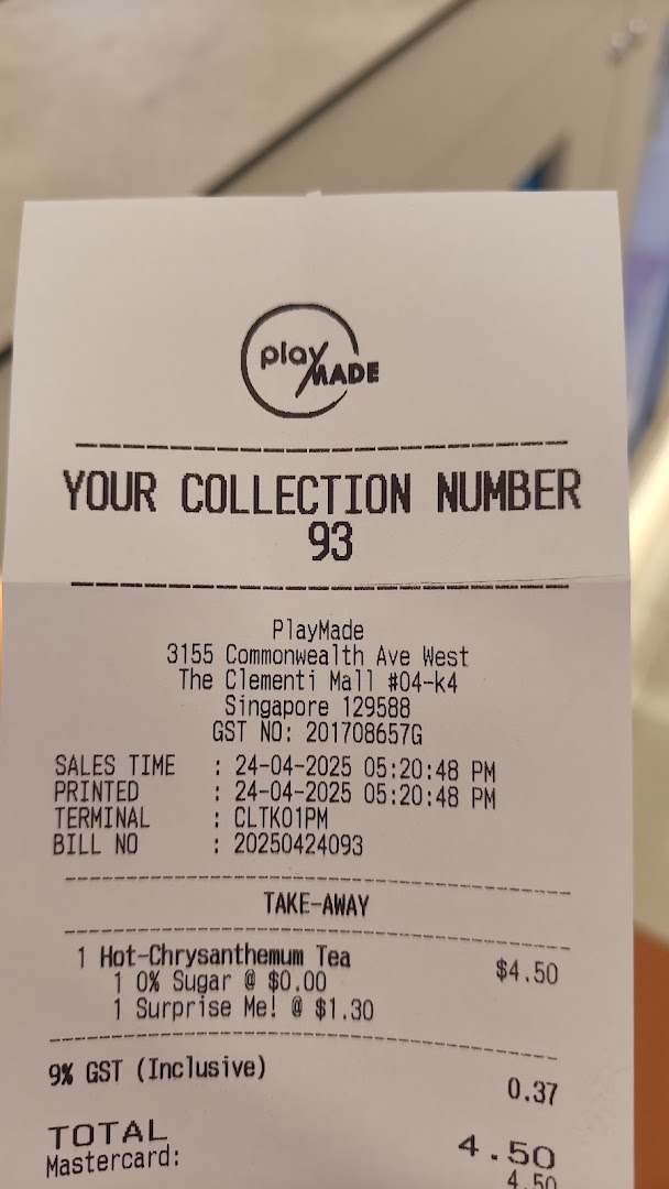 Close-up of a PlayMade receipt showing a collection number and details of a beverage order.