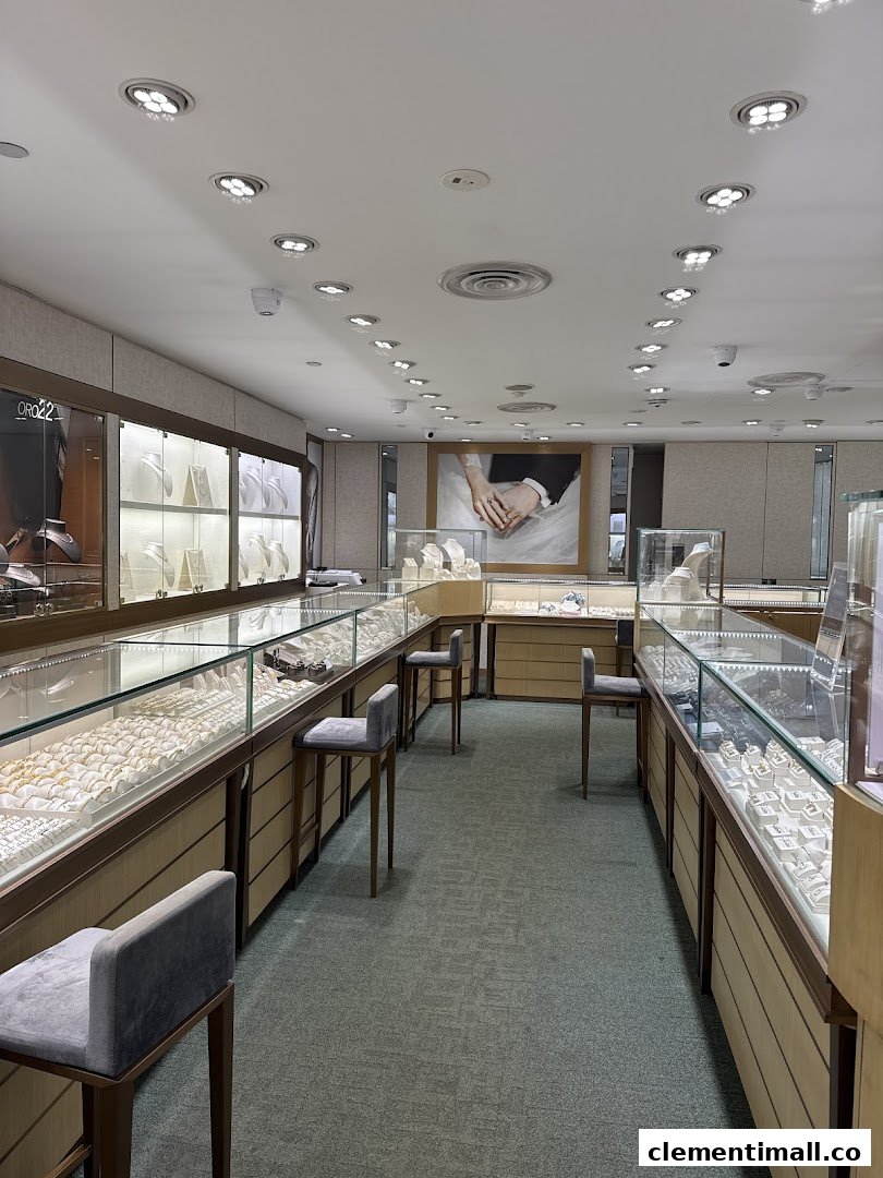 Interior view of Poh Heng Jewellery, showcasing numerous display cases filled with exquisite jewelry.