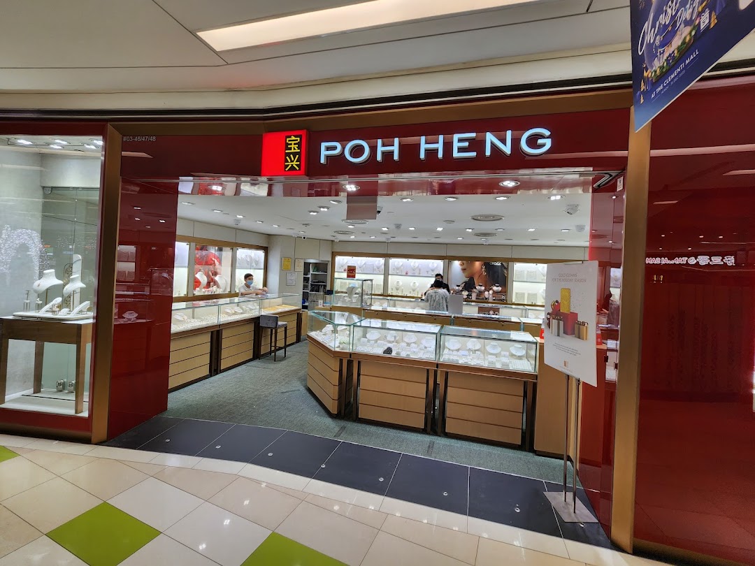 The storefront of Poh Heng Jewellery, showcasing its elegant displays and inviting entrance.
