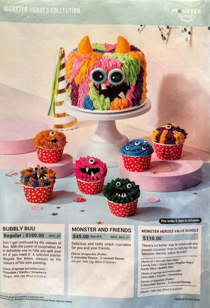 A vibrant display of monster-themed cakes and cupcakes with pricing and product details.