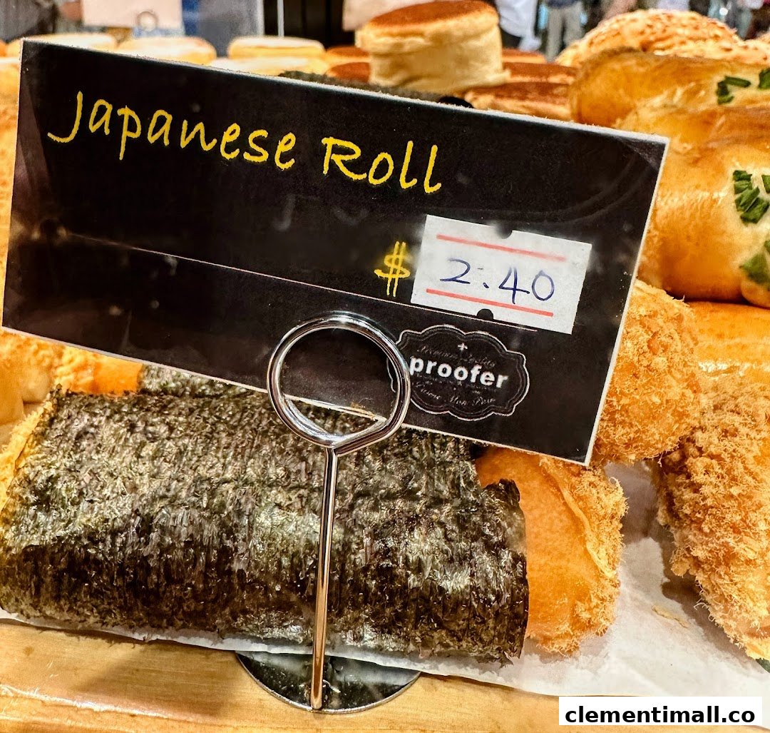 Close-up of a Japanese Roll pastry with its price tag at Proofer Boulangerie.