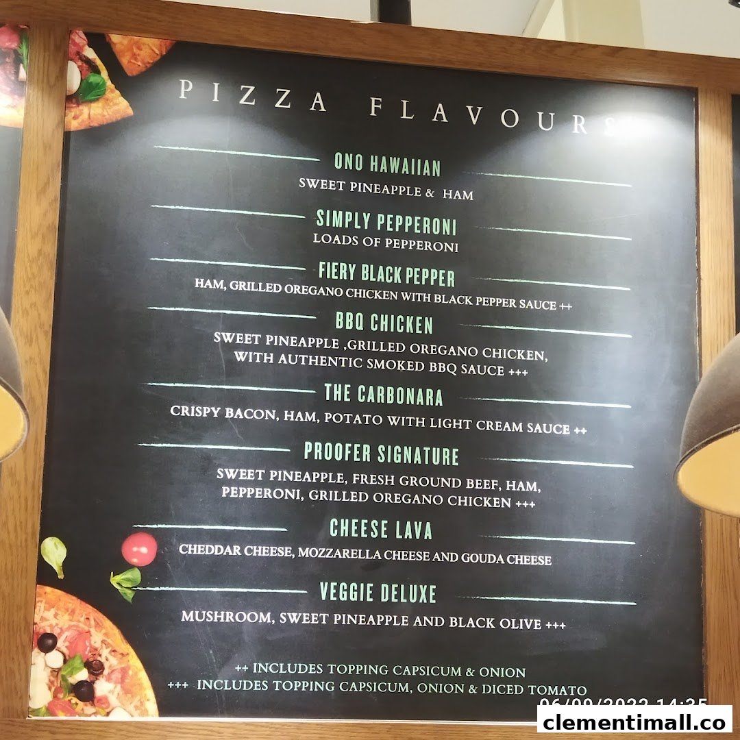 A menu board displaying various pizza flavors and their ingredients at Proofer Boulangerie.