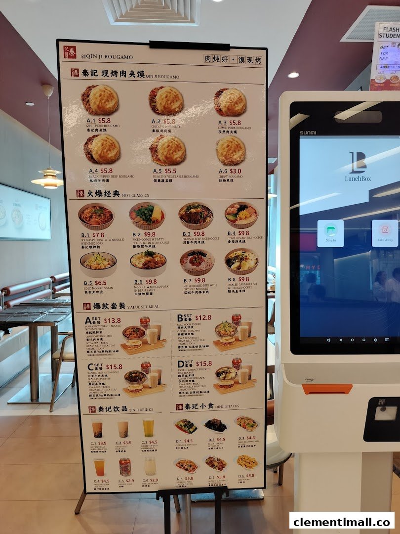A detailed menu board for Qin Ji Rougamo, showcasing various rougamou, noodle dishes, set meals, drinks, and snacks.