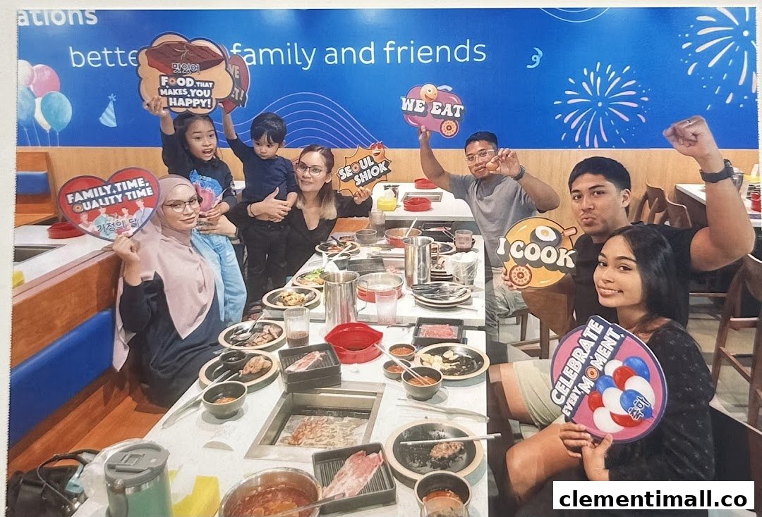 A lively group of friends and family enjoying a Korean BBQ and hotpot meal at Seoul Garden.