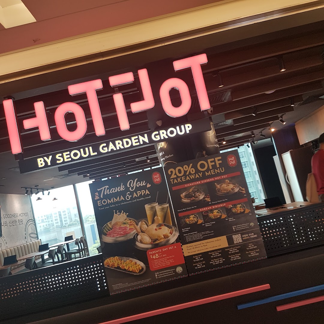 Interior view of Hotpot by Seoul Garden Group, showcasing hotpot and Korean bibimbap promotional menus.