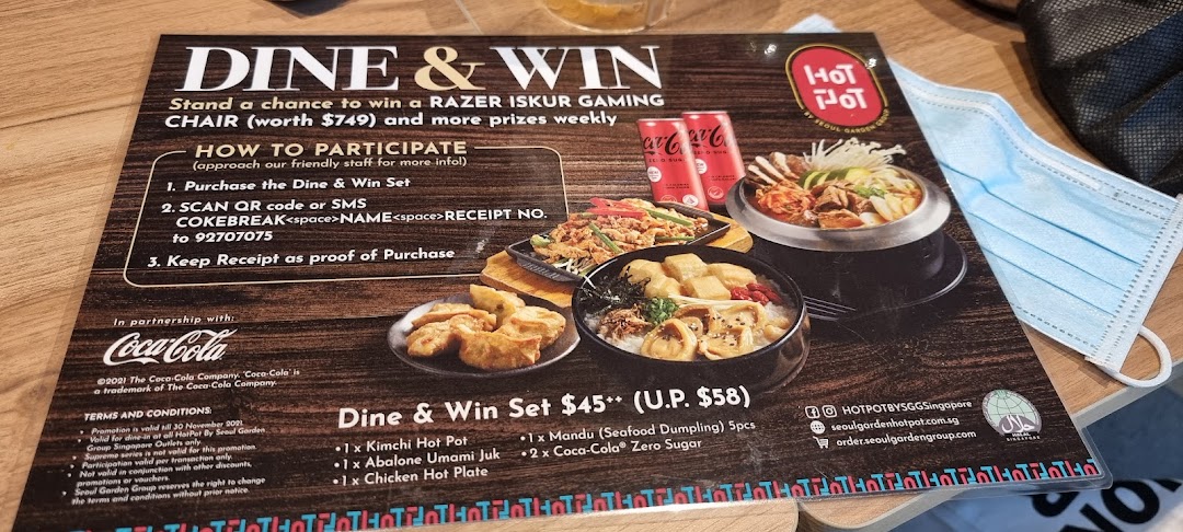 A promotional flyer for Seoul Garden's 'Dine & Win' set, featuring Korean dishes and a gaming chair giveaway.