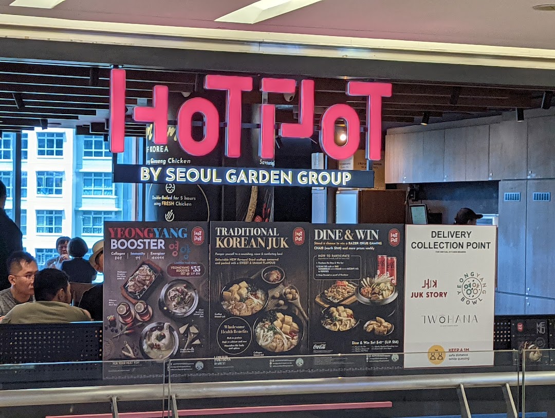 A vibrant display of menu items and promotions for 'Hotpot by Seoul Garden Group', featuring Korean juk and booster sets.