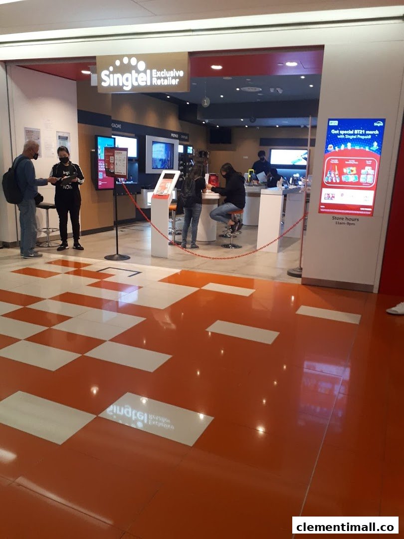 The entrance of a Singtel Exclusive Retailer store with customers and staff inside.