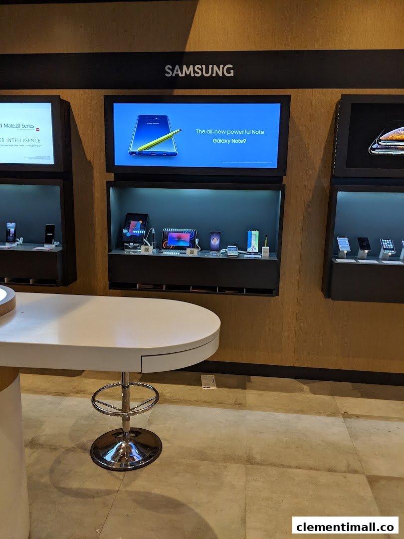 An interior shot of Singtel's retail space showcasing Samsung mobile devices and a promotional display.