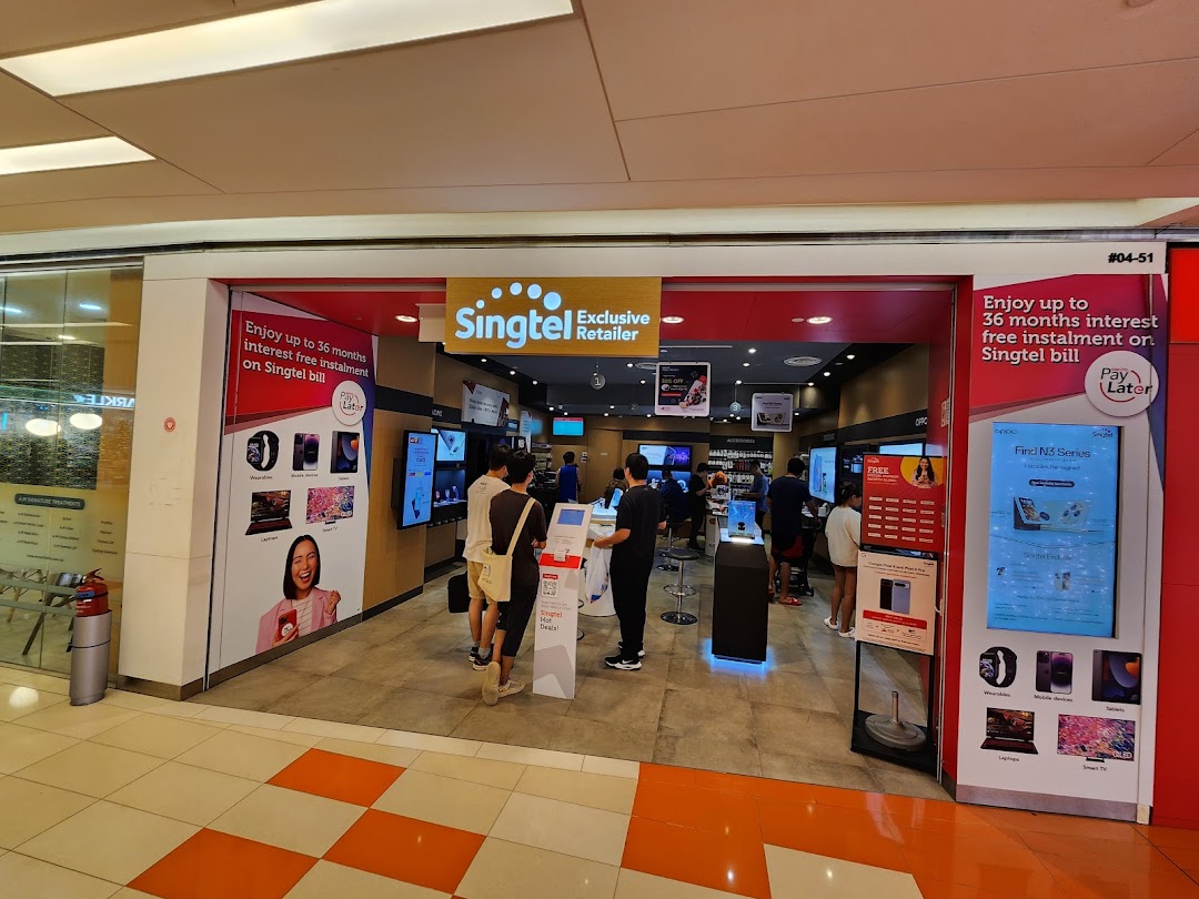 The shop front of Singtel Exclusive Retailer at Clementi Mall, showing customers browsing devices.