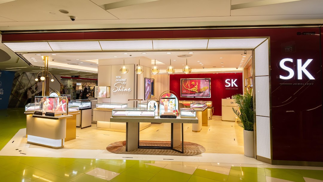 The brightly lit entrance of SK Jewellery showcasing elegant displays and inviting signage.