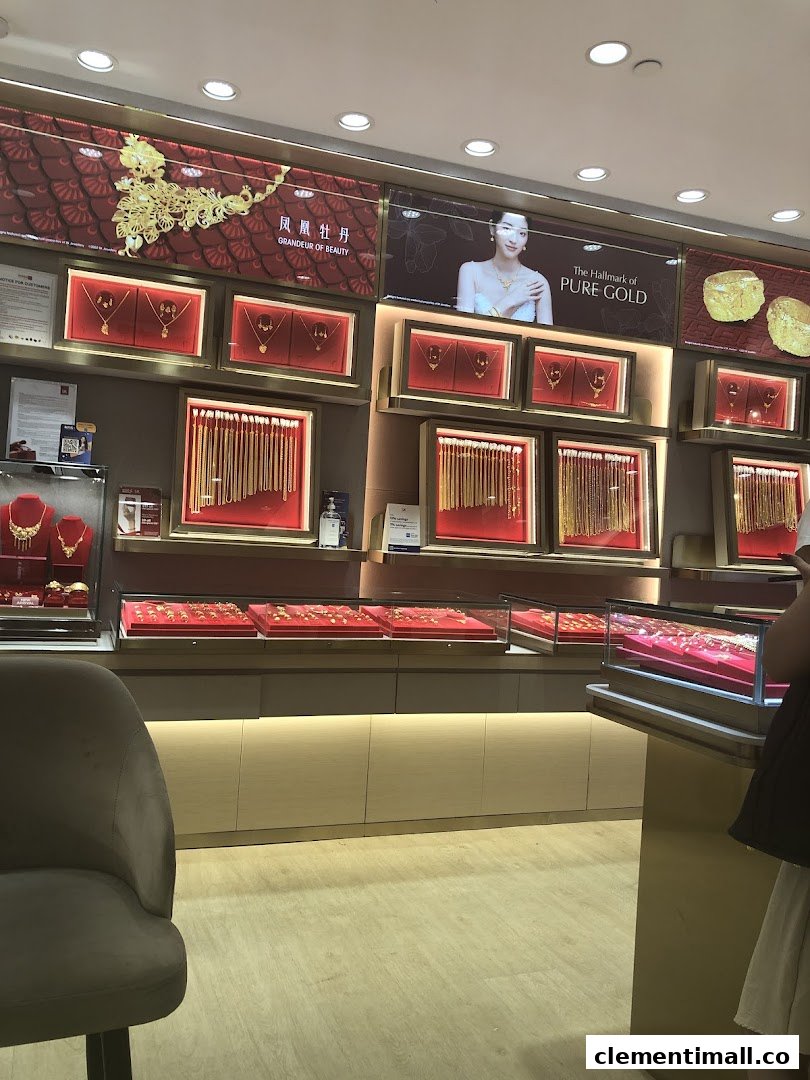 Interior view of SK Jewellery showcasing various gold jewellery pieces in illuminated display cases.