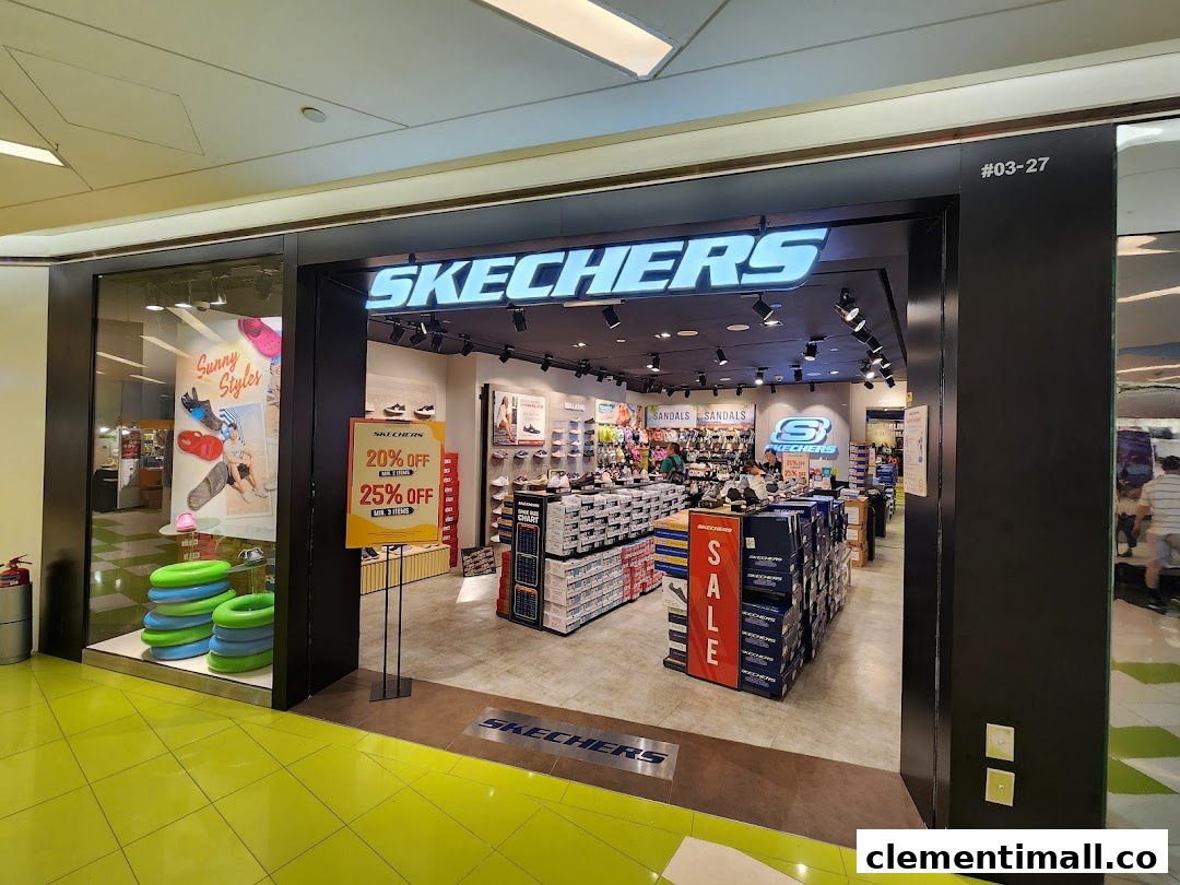 The brightly lit entrance of a Skechers shoe store, showcasing its interior and a prominent sale sign.