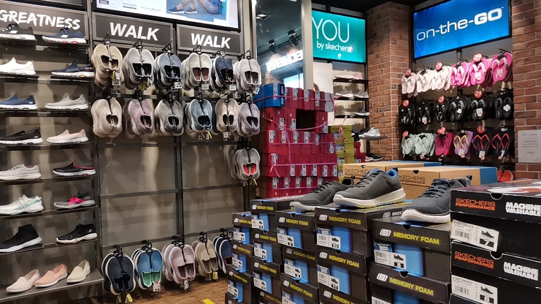 An interior view of a Skechers store showcasing a wide range of comfortable footwear.