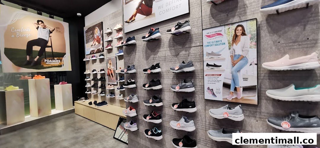 An interior view of a Skechers store showcasing various athletic and casual footwear on display walls and pedestals.