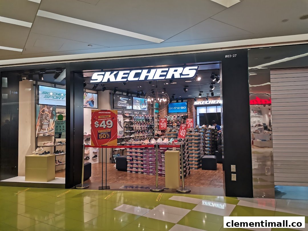 The image shows the brightly lit entrance of a Skechers shoe store with promotional signage and visible footwear displays.