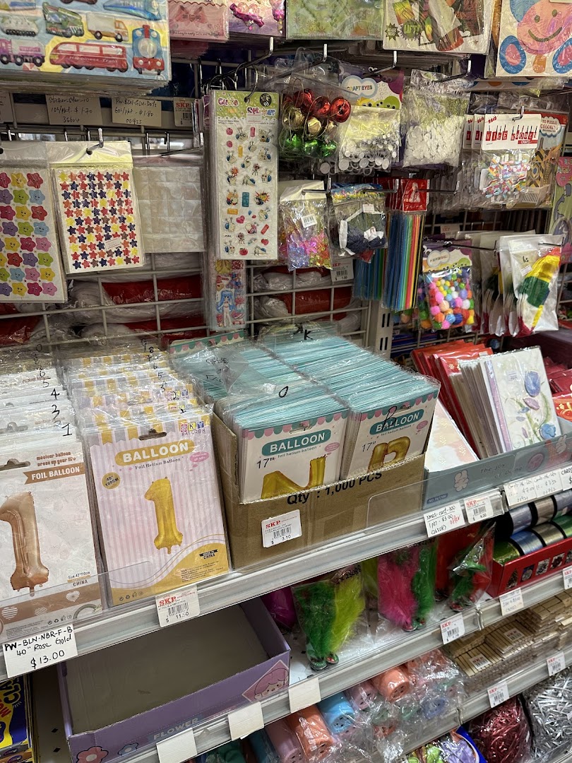 Shelves stocked with party supplies, balloons, and craft items at SKP Clementi Mall.