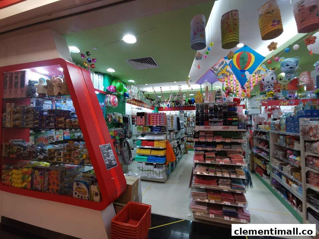 Interior view of a vibrant shop filled with toys, stationery, and party supplies, featuring colorful decorations.