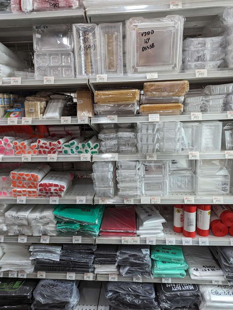 Shelves stocked with various packaging materials, disposable containers, and plastic bags at SKP.