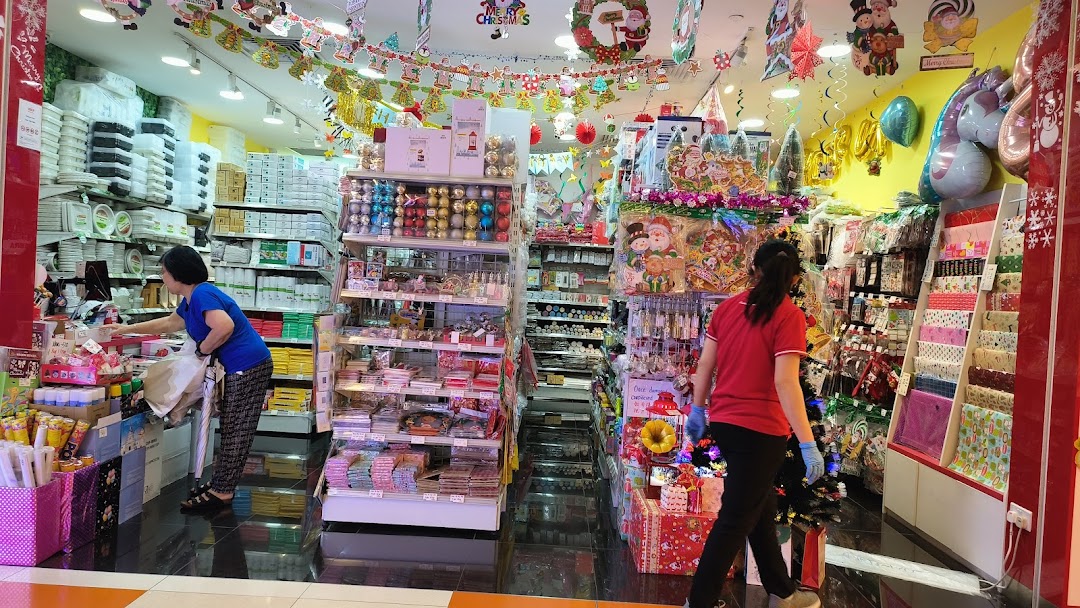 Interior view of SKP Clementi Mall, a shop filled with party supplies, disposable goods, and festive Christmas decorations.