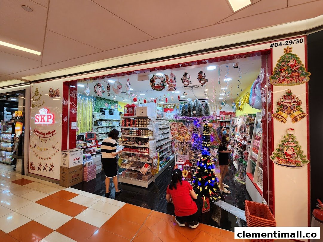 The shop front of SKP, decorated with festive Christmas items and featuring customers browsing inside.