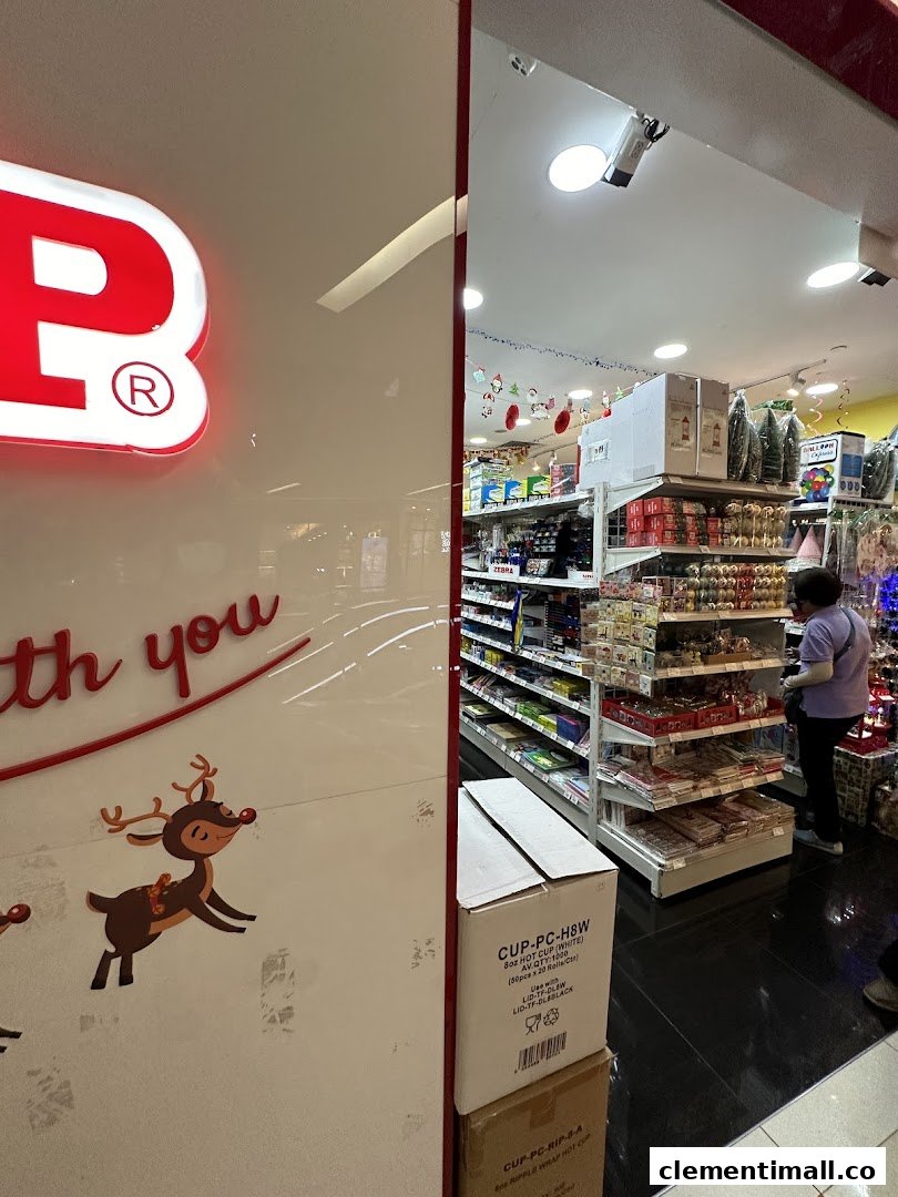 Interior view of SKP shop with shelves stocked with various products and a customer browsing, featuring festive decorations.