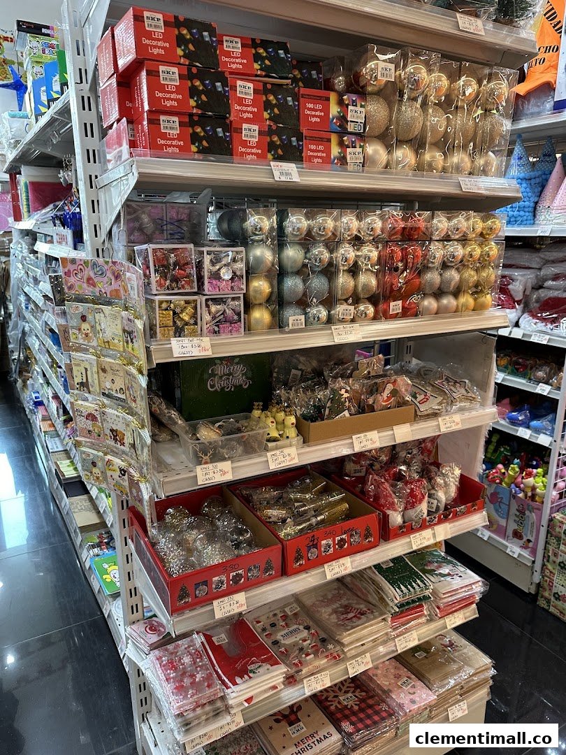 Shelves filled with a variety of festive decorations, including LED lights, ornaments, and party supplies.