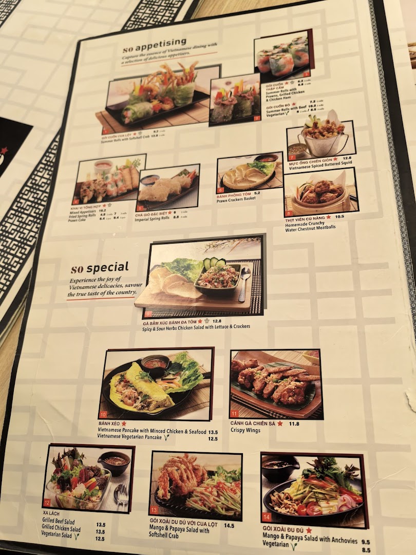 A close-up view of a Vietnamese restaurant menu, showcasing appetizers and salads.