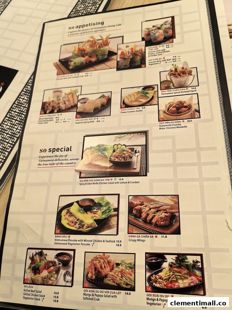 A close-up view of a Vietnamese restaurant menu, showcasing appetizers and salads.