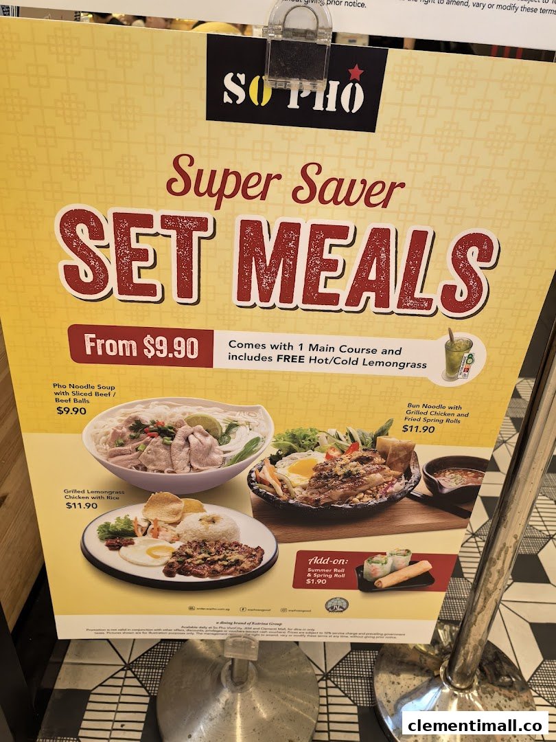 A promotional stand displaying 'Super Saver Set Meals' from So Pho, featuring Vietnamese dishes and prices.