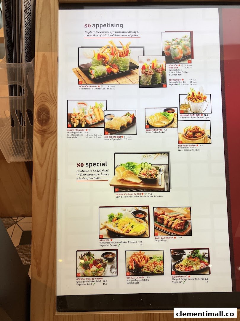 A detailed menu board showcasing a variety of Vietnamese appetizers and specialties with images and prices.