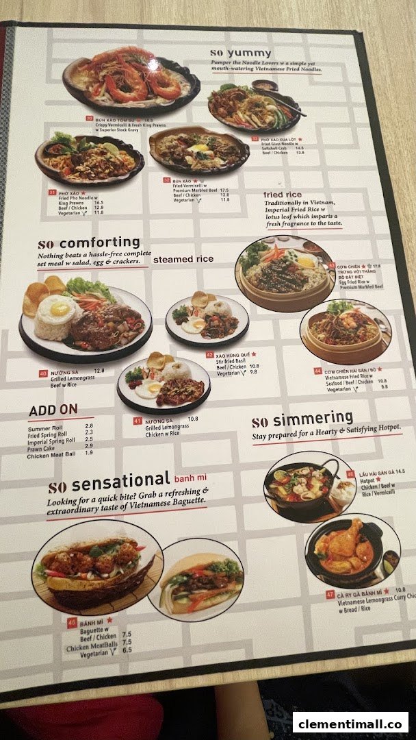 A detailed menu displaying various Vietnamese dishes, including noodles, rice, set meals, and banh mi.