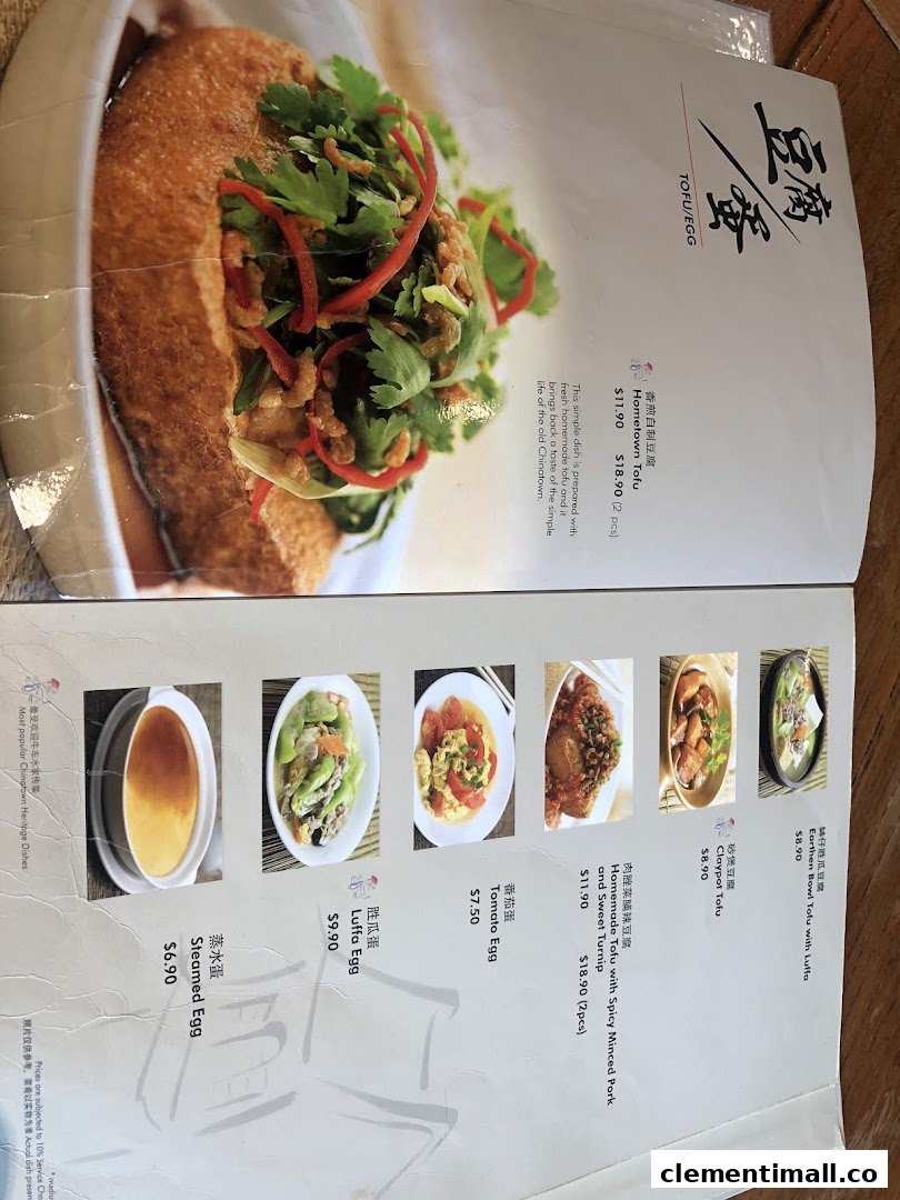 An open menu page from Soup Restaurant, showcasing various tofu and egg dishes with prices and descriptions.