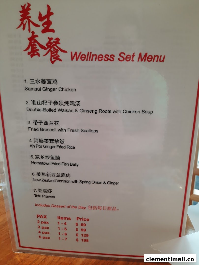 A close-up of Soup Restaurant's Wellness Set Menu, detailing dishes and set prices for different group sizes.