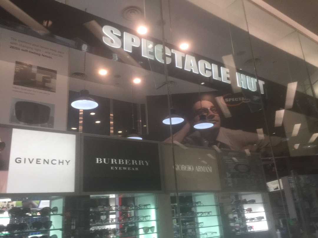Shopfront of Spectacle Hut, an optical store, featuring luxury eyewear brands.