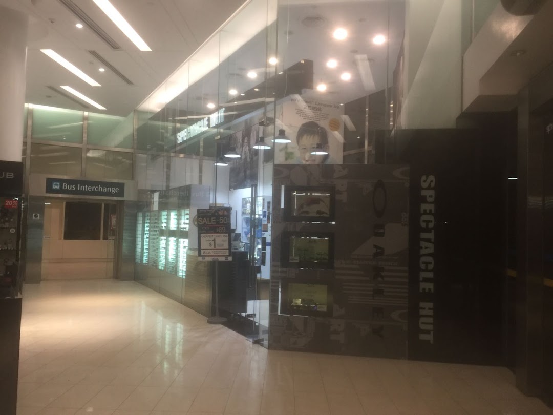 The storefront of Spectacle Hut at The Clementi Mall, featuring eyewear displays and promotions.