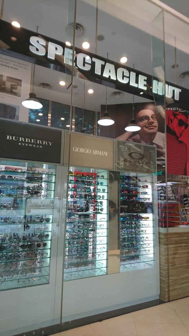 The storefront of Spectacle Hut, showcasing a wide range of eyewear and designer brands.