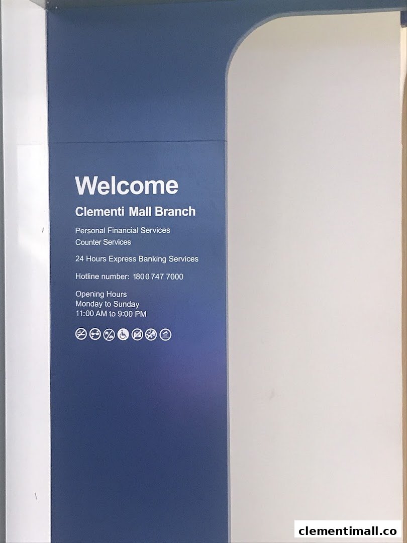 A welcome sign for Standard Chartered Bank's Clementi Mall Branch, detailing services and operating hours.