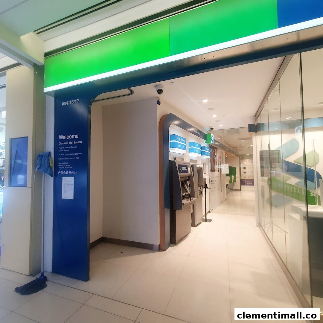 Entrance of Standard Chartered Bank at Clementi Mall, featuring ATMs and a welcome sign.