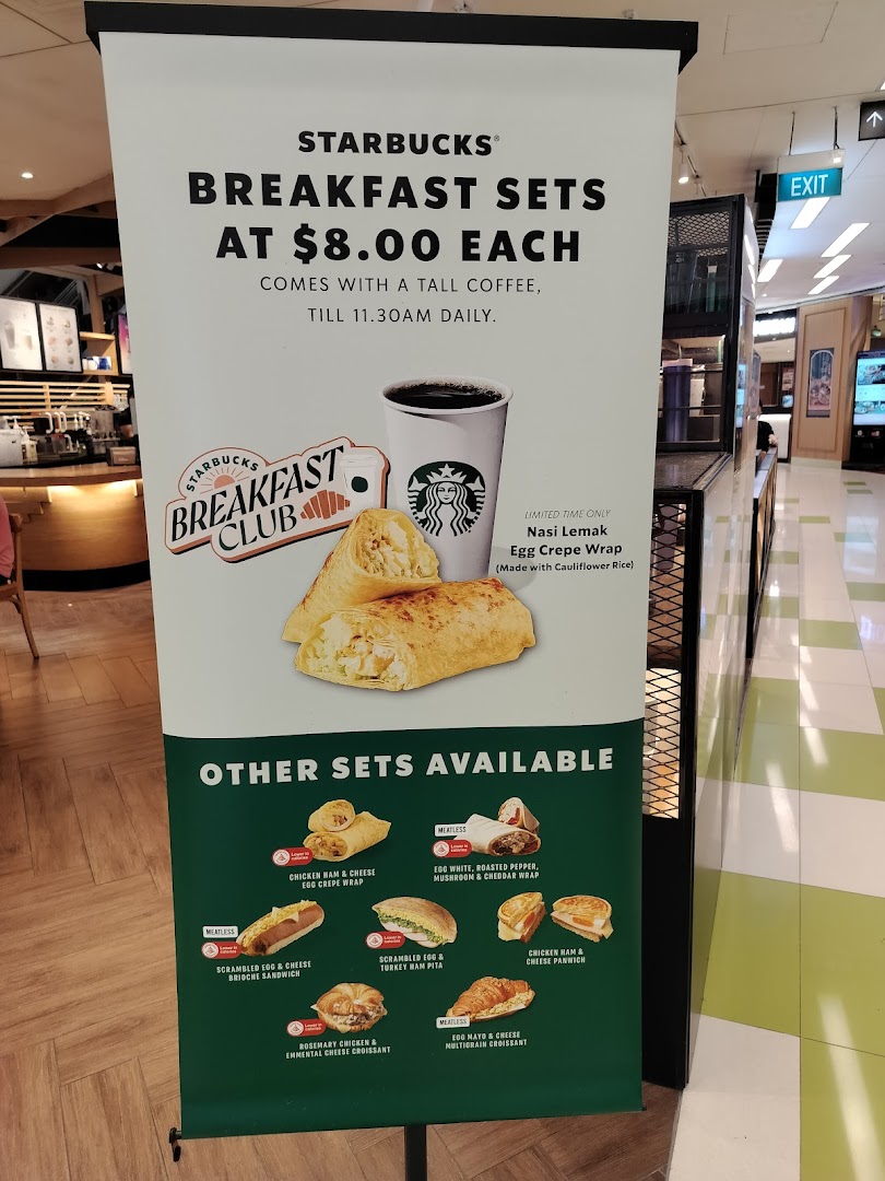 A Starbucks promotional banner showcasing breakfast sets available for $8.00 each, including various food items.