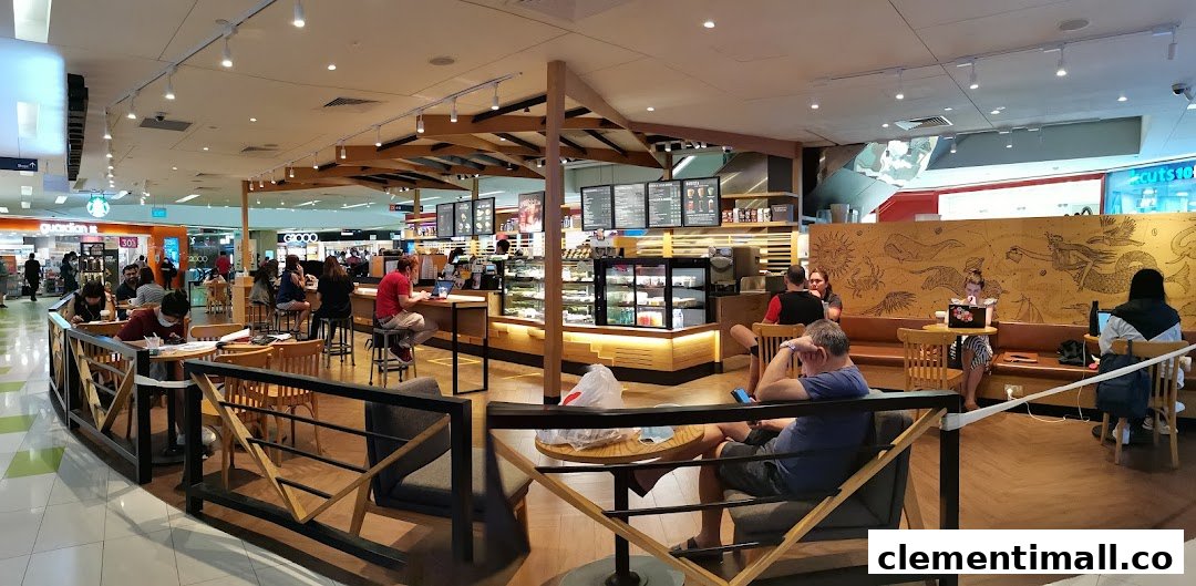 A bustling interior view of Starbucks Clementi Mall with customers enjoying coffee and the cozy ambiance.