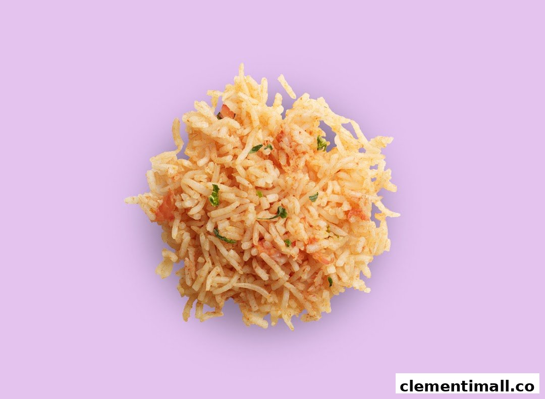 A vibrant close-up of seasoned rice with herbs and tomatoes on a light purple background.