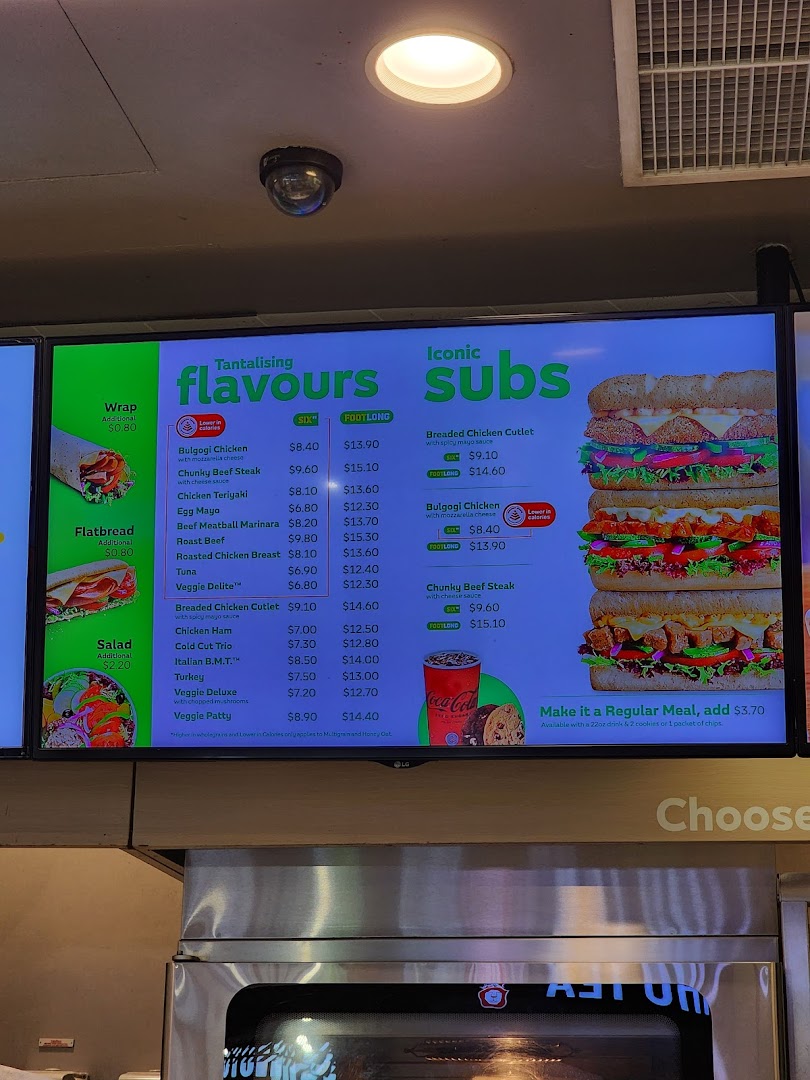 A digital menu board displaying Subway's tantalizing flavours and iconic subs with prices.