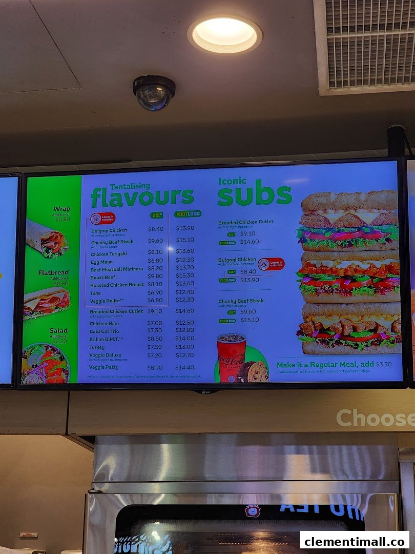 A digital menu board displaying Subway's tantalizing flavours and iconic subs with prices.