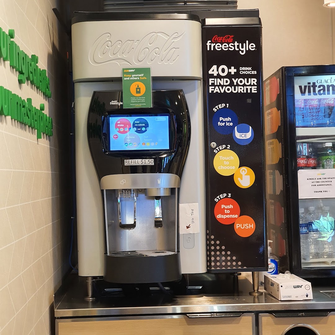 A Coca-Cola Freestyle machine offering 40+ drink choices inside a Subway restaurant.