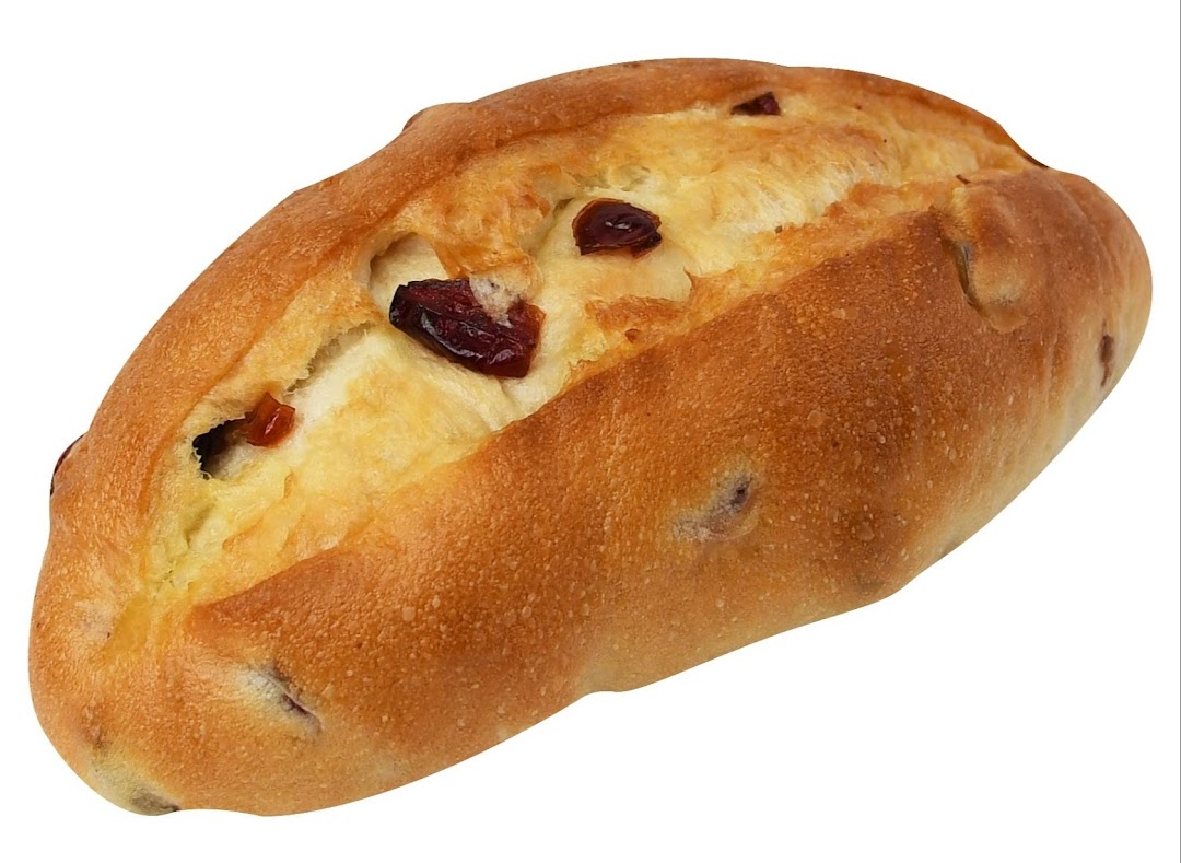 A golden-brown baked bun with a creamy filling and visible dried cranberries.