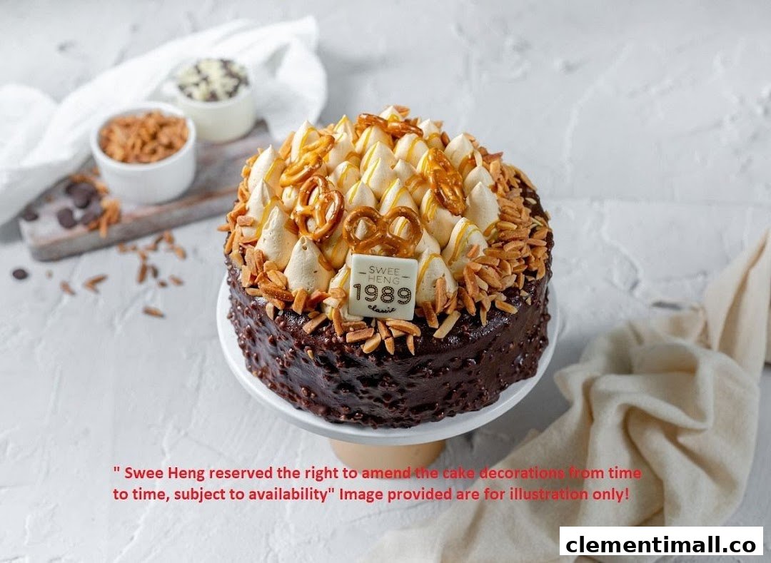 A chocolate cake with cream, pretzels, and almonds on a white stand.