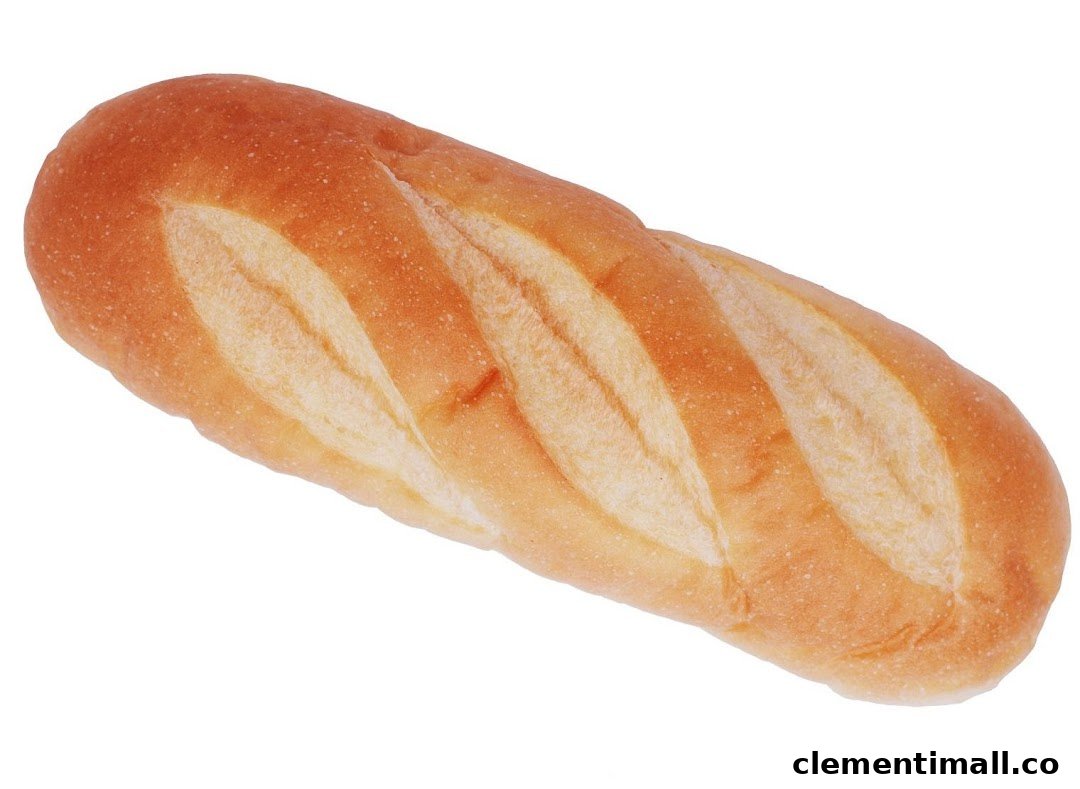 A golden-brown loaf of bread with diagonal scoring on a white background.